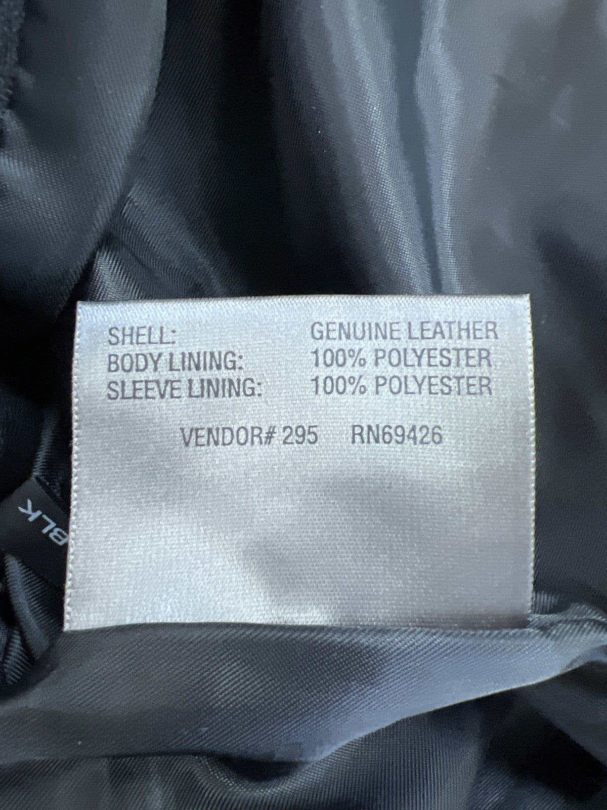 Wilsons Leather Women’s Black Leather Long Button Up Jacket - L