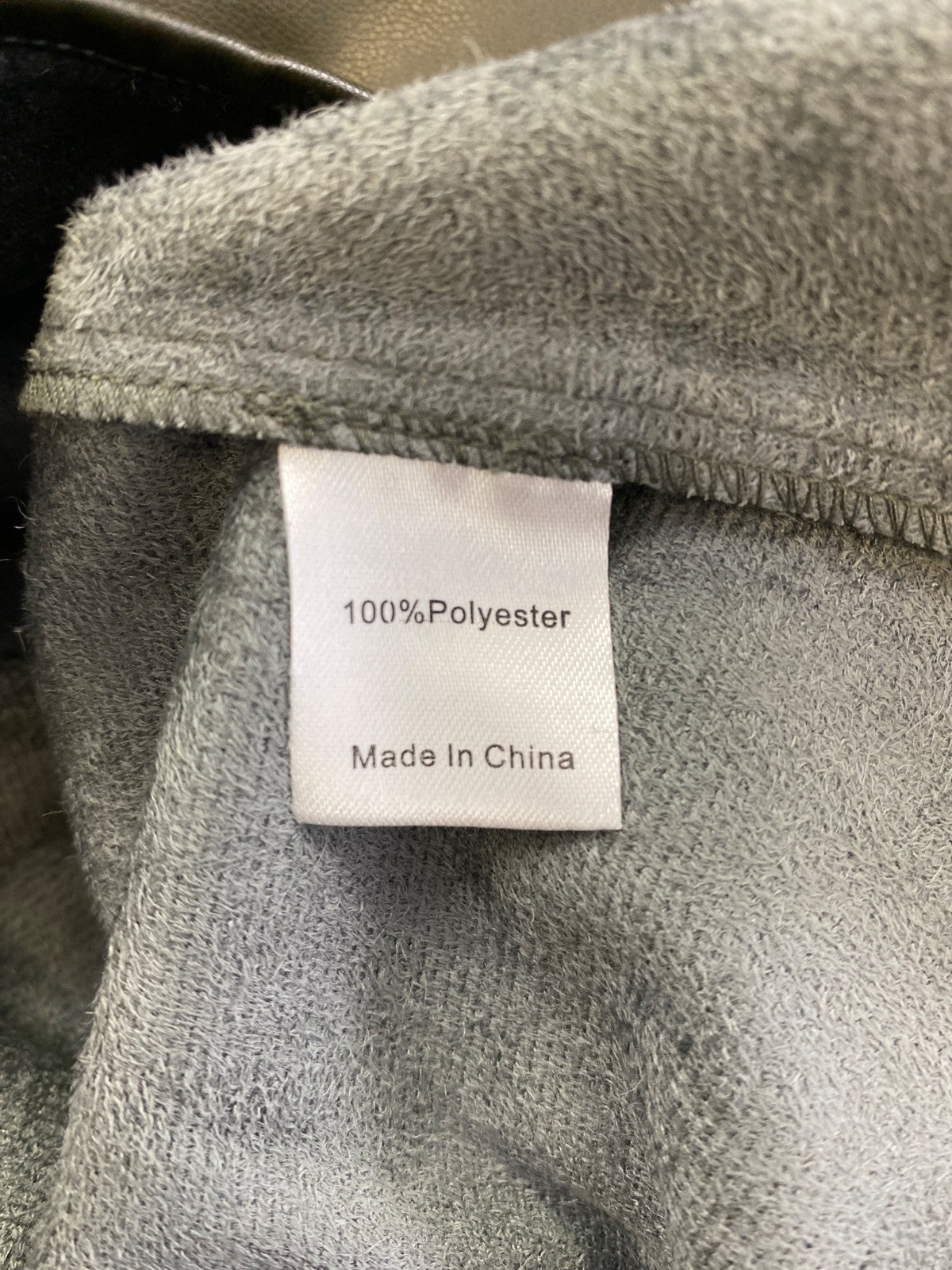 Tuckernuck Women’s Olive Green Ruffle Trim Tie Back Faux Leather Blouse - L