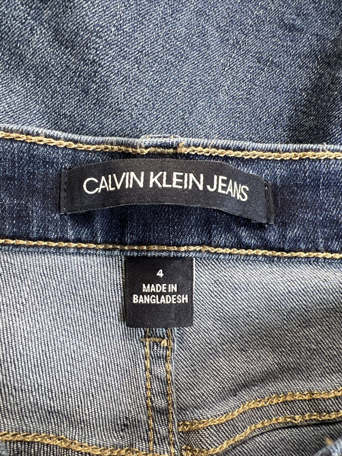Calvin Klein Women's Medium Wash High Rise Denim Cut Off Shorts - 4