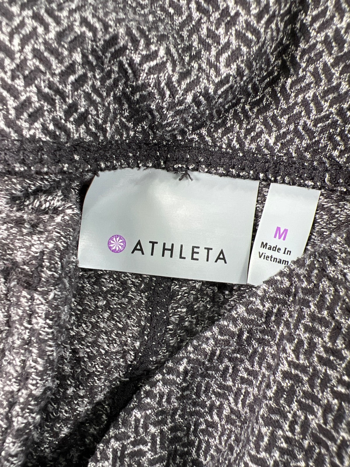 Athleta Women’s Black/Gray Criss Cross High Waisted Metro Leggings - M