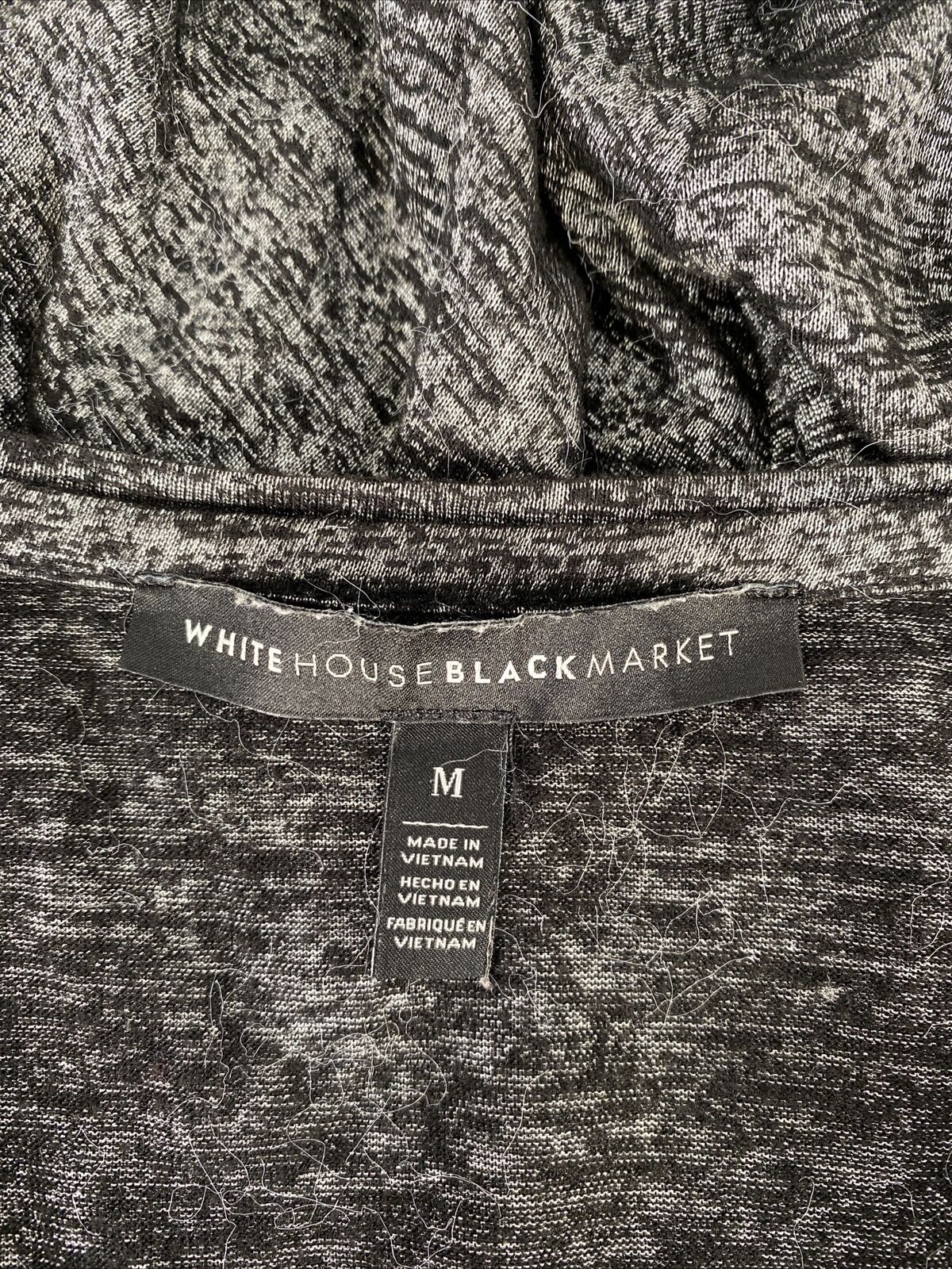 White House Black Market Women's Black Sleeveless V-Neck T-Shirt - M