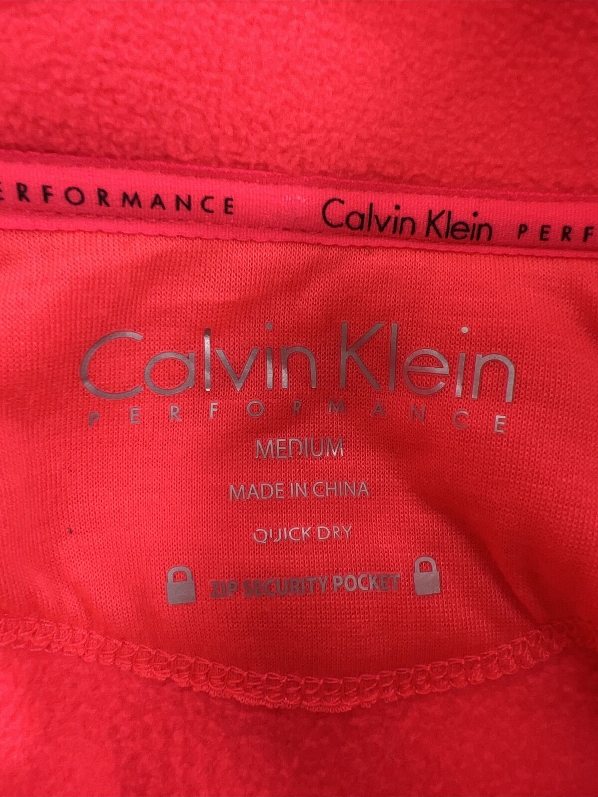 Calvin KleinChaqueta polar de rendimiento con cremallera completa rosa para mujer - M
