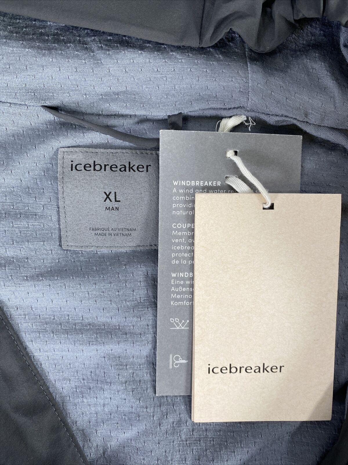 NUEVA chaqueta cortavientos con capucha Icebreaker Tropos gris para hombre - XL