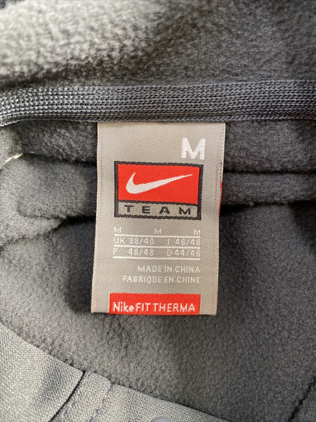 Nike Team Sudadera con capucha de manga larga MSU Therma gris/verde para hombre talla M