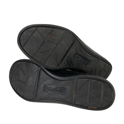 Skechers Mocasines planos sin cordones y cómodos con ajuste en arco para mujer, color negro, 9